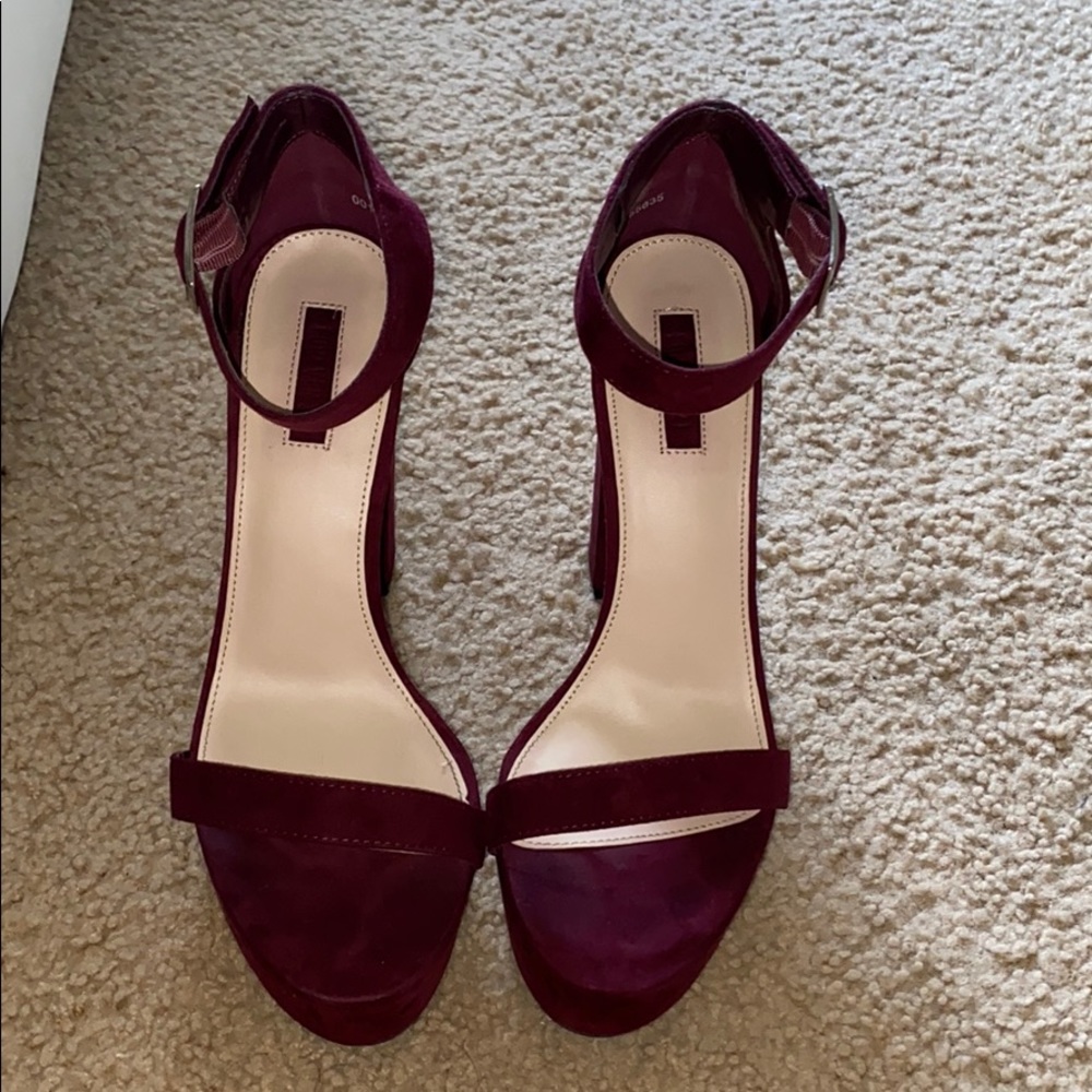 Wine colored platform heels. Only worn once.